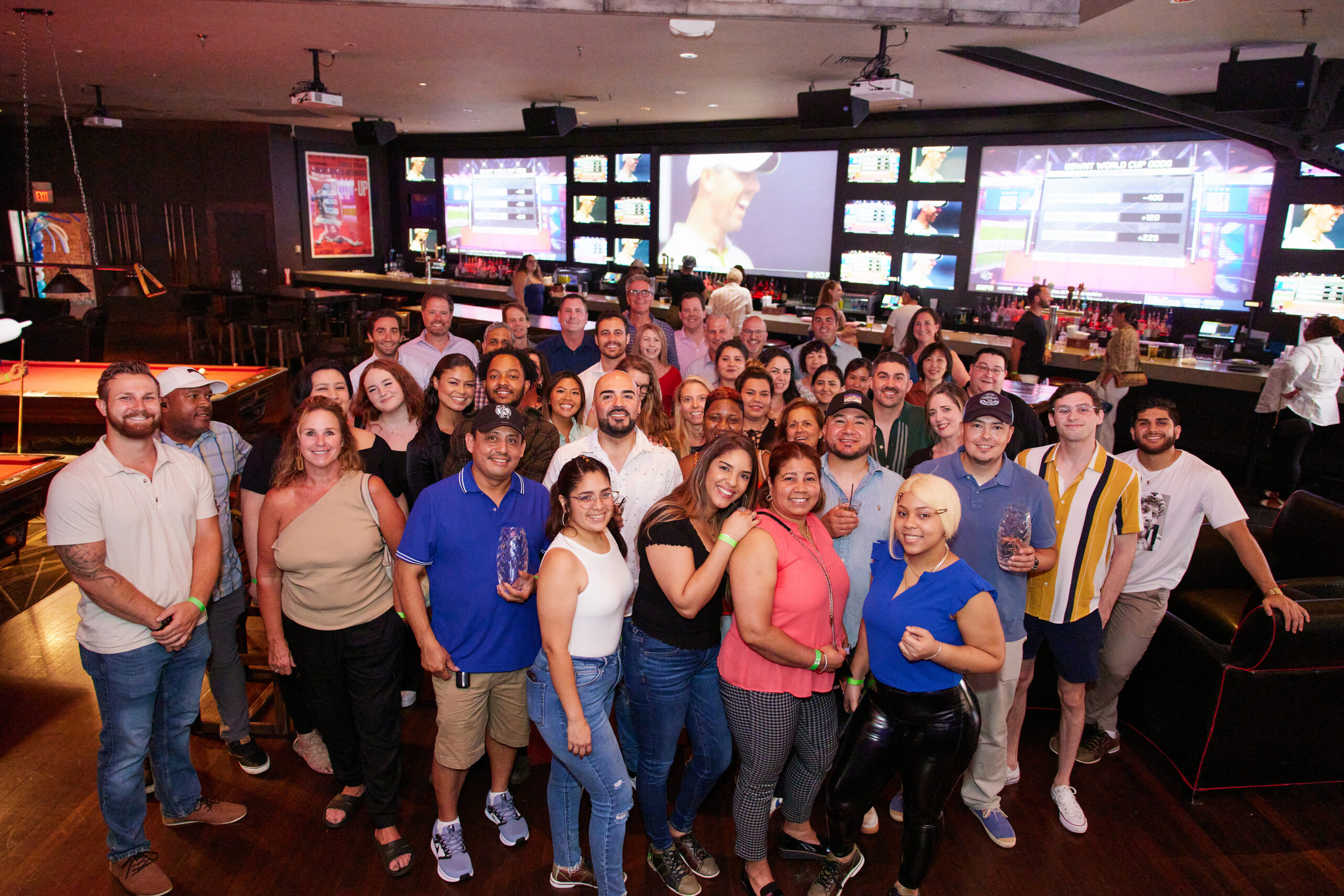 Employees of the Residence Inn Fenway Hotel celebrating 10 year anniversary with a bowling party