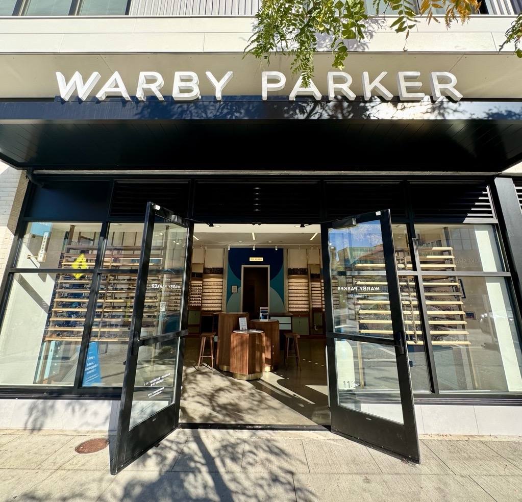 An image of the Warby Parker storefront at Arsenal Yards