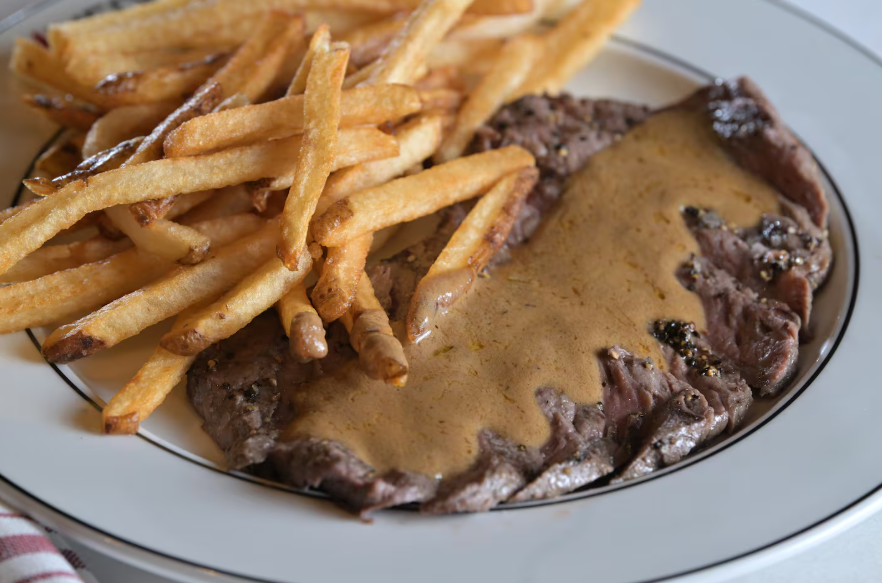 Culotte steak with fries and secret sauce at Medium Rare in Arsenal Yards. JOSH REYNOLDS FOR THE BOSTON GLOBE